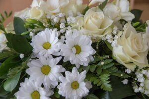 Do I have to use a funeral director in the UK